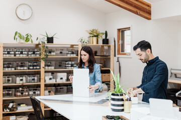 Husband and Wife Small Business Owners in Home Office