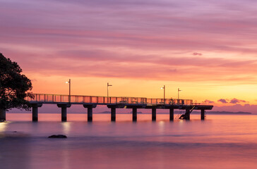 Fototapeta na wymiar Murray Bay Jetty, North Shore, NZ at Sunrise