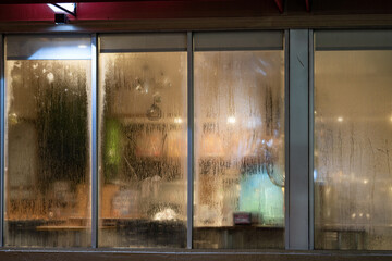 Photo of condensation on glass window restaurant diner closed - obrazy, fototapety, plakaty
