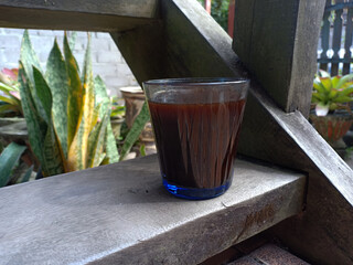 black coffee powder and a glass of coffee