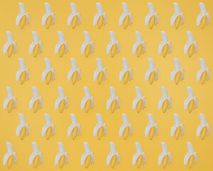 Bananas texture on yellow background