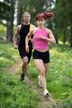 young fit couple running