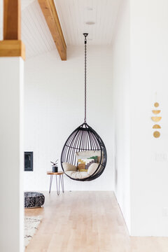 Hanging Chair in Bright, Bohemian Living Room