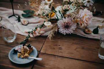 close-up of wedding cake and florals of a styled wedding table