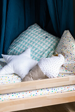 Cute Pillows on Cild's Bed