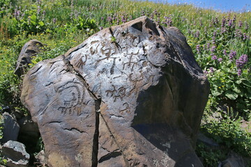Petroglips on the rocks in Saimalutash valley