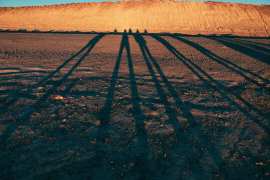 Long shadow of a group of people