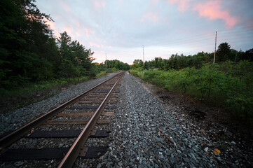 railroad tracks sunset