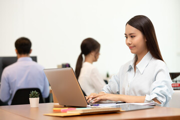Obraz premium Business asian woman happy working job on laptop in office.