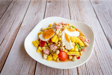 Spicy corn salad with salted egg, Thai food