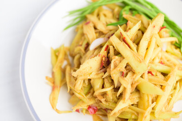 Thai food, spicy green mango salad (Tum Ma Muang)
