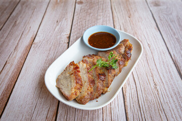 Grilled pork neck on dish