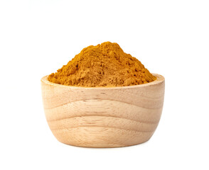 Dry turmeric powder or curcuma longa linn in wooden bowl isolated on white background.