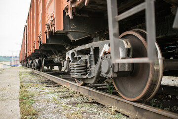 Fototapeta na wymiar Train wheel. Railway. Close up view of the wheels of the train.