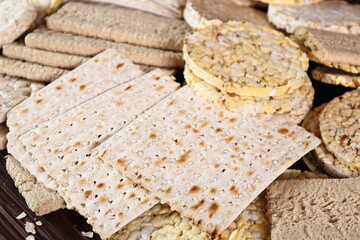 Different types of crispbread. Rice cake, Corn Thins, Matzo, Rye Crispbread.