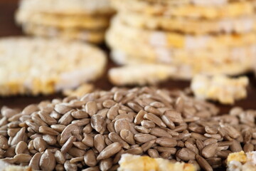 Corn Thins and suflower seeds. Macro.
