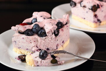 Cold cheesecake with blueberry and strawberry