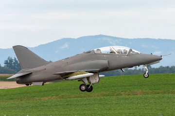 Air Force jet trainer aircraft taking off.
