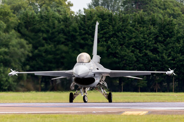 Multirole fighter jet taxiing onto the runway.