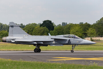 Fototapeta na wymiar Fighter jet on runway.
