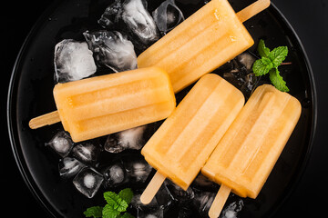 Homemade delicious ice lolly of cantaloupe melon. Healthy summer dessert.