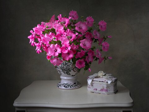 Still life with splendid bouquet of pink flowers