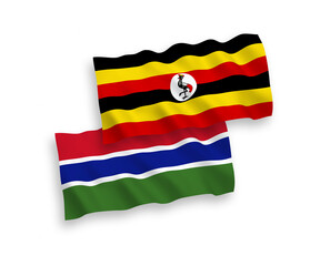 Flags of Republic of Gambia and Uganda on a white background