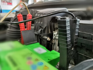 an image of charging car battery