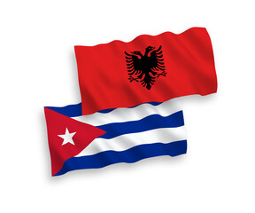 Flags of Albania and Cuba on a white background