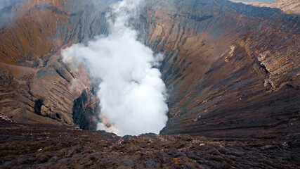 Photo of smoke volcano crater on Java island