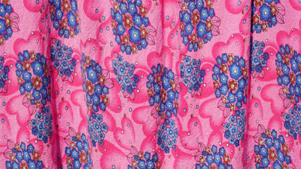 Pink floral pattern fabric used to make the background.