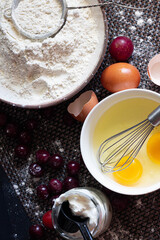 baking ingredients for baking cake with cherry