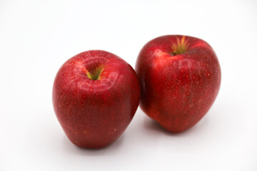 Duo of red apples on a white background