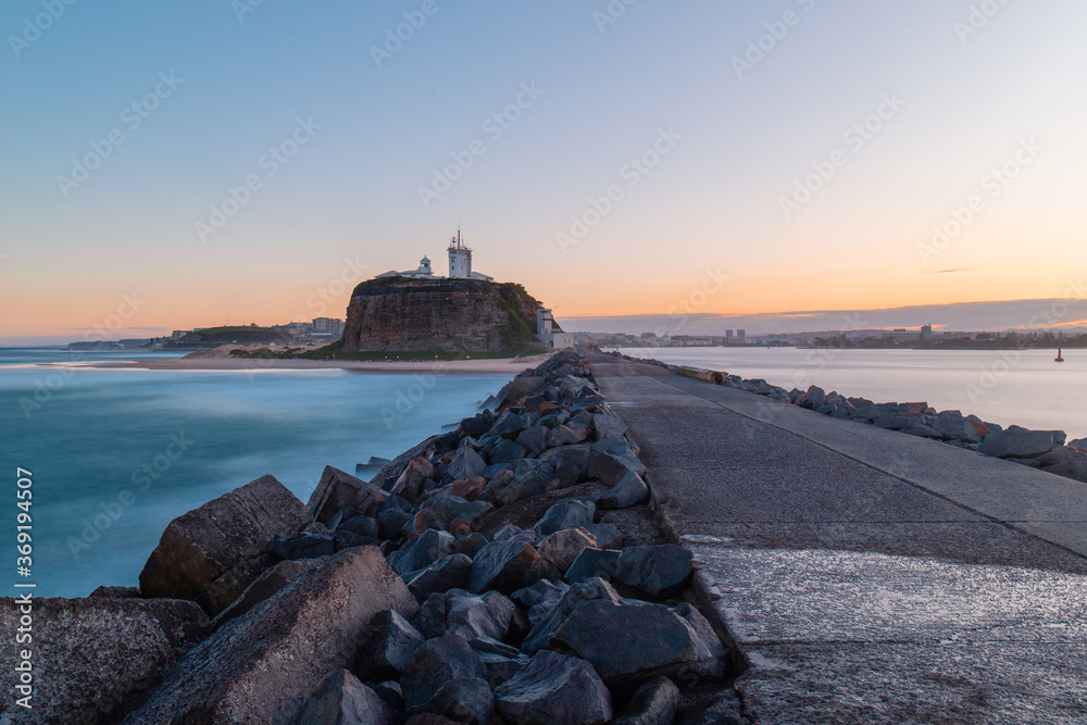 Canvas Prints view of nobbys lighthouse from newcastle breakwall.