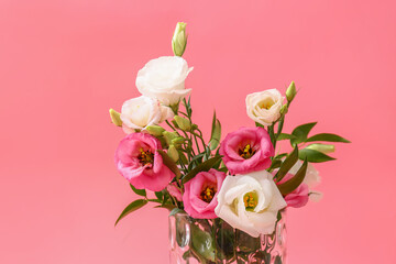 Naklejka na ściany i meble Beautiful vase with flowers on color background