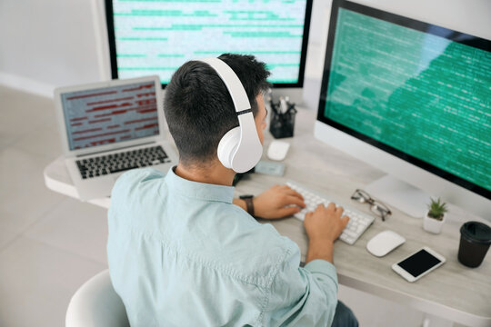 Male programmer working in office