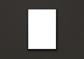 Blank picture frame hanging on a black wall