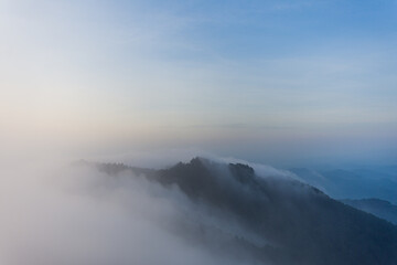 beautiful view on top mountain and mist at morning light. soft focus.
