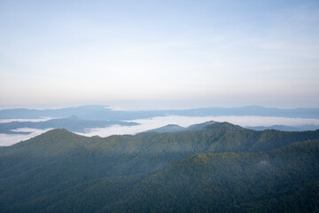 beautiful view on top mountain and mist at morning light. soft focus.