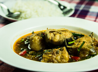 Fried cat fish with chili paste in plate, in door  Chiangmai Thailand
