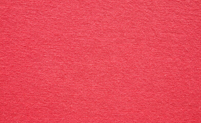Red fabric cloth texture background close up