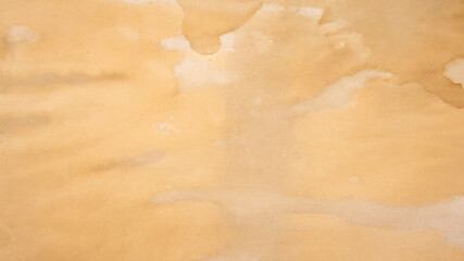 Old brown paper texture. Yellow autumn watercolor texture with abstract washes and brush strokes on the white paper background. Chaotic abstract organic design.