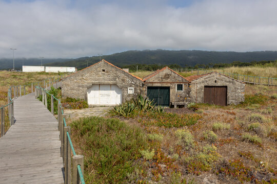 Fishermen warehouses in the Praia de Pa&ccedil;&ocirc; Beach, also known as Praia do Forte Beach in Carreco, Viana do Castelo, Portugal.