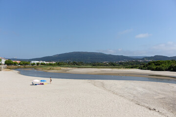 Fototapeta na wymiar Mouth of the Âncora River and its estuary in Vila Praia de Ancora, Portugal.