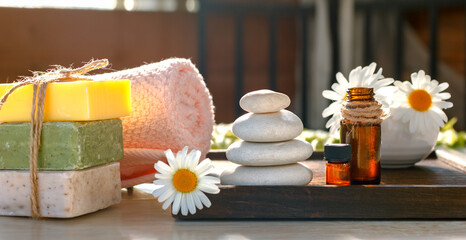Spa set - chamomile flowers, body oils, organic soap and towel  best suited for relaxing and health commercialsm