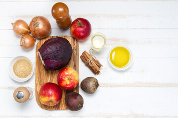 Red cabbage, onions, beets, apples, sugar, cinnamon sticks, salt, pepper, vinegar and olive oil