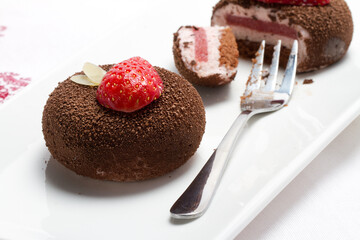 Homemade chocolate and strawberry cakes