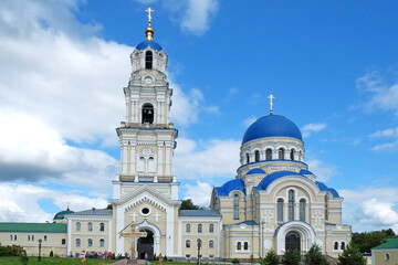 Fototapeta premium Monastery St. Uspenskaia Tikhonova pustyn (1485), Uspensky Cathedral (1894) and bell tower. Kaluga region (2015).
