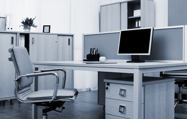 monitor on a desk in modern office