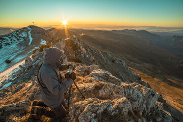 Someone taking photo of a landscape 